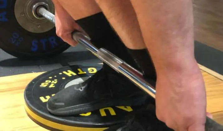 Bring your shins to the deadlift bar