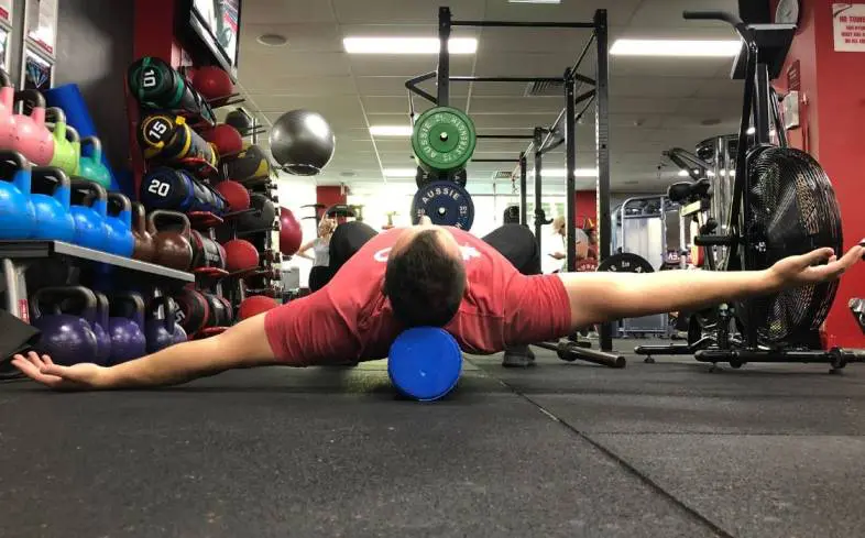 Test your shoulder flexion mobility to diagnose your uneven bench press