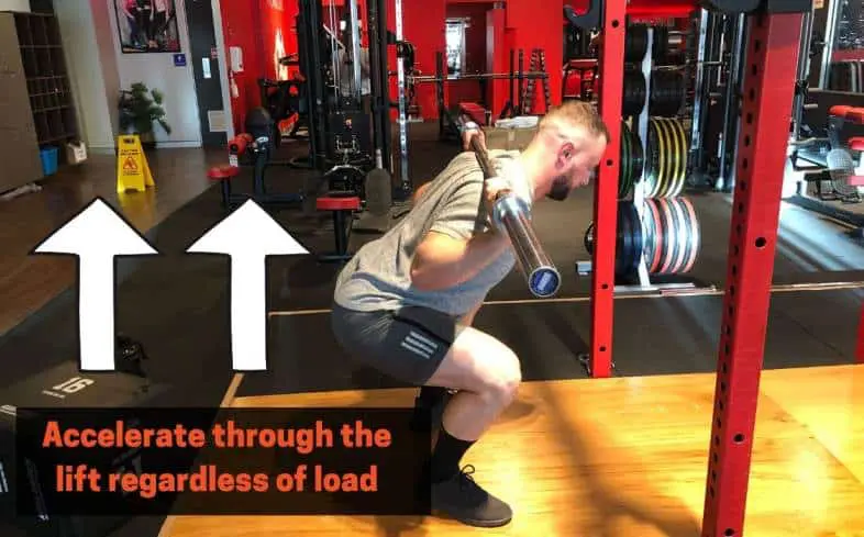 squat cue accelerate through the lift