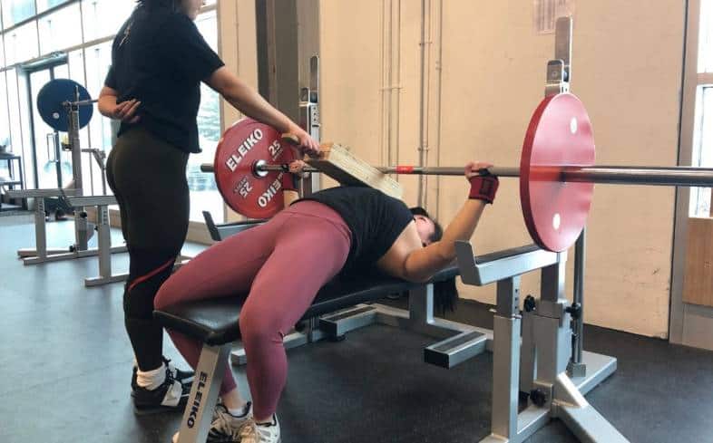 Showing the 2-board bench press