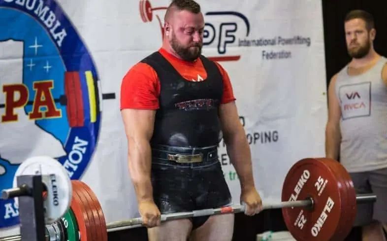 A professional powerlifter competes at a powerlifting competition. Photo by PowerliftingTechnique.com.