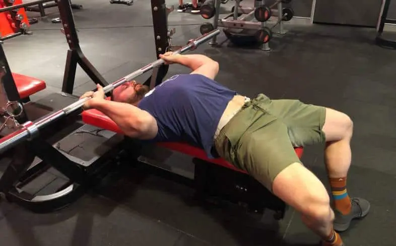 Why powerlifters don't train arms