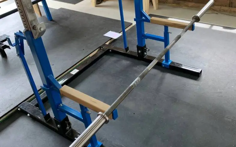 need a squat cage to be able to grab the barbell while you lay on the floor