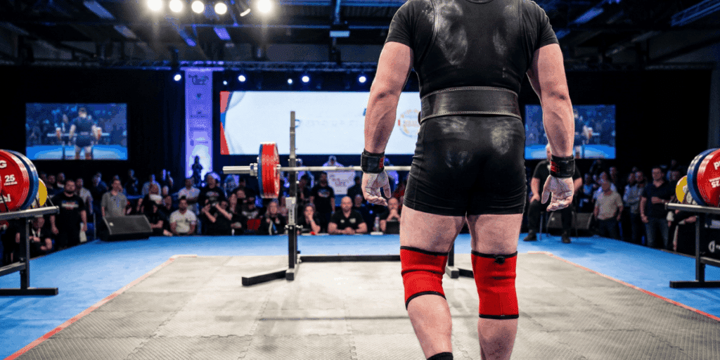 A powerlifter gearing up for competition with USAPL and IPF approved gear.
