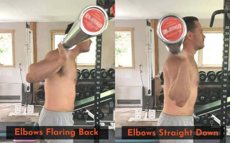 slightly flaring your elbows back may make it easier to hold onto the bar when low bar squatting