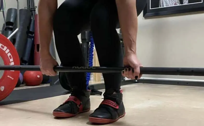 one of the quickest ways you can gain an advantage in the deadlift as a tall guy is to deadlift using flat shoes