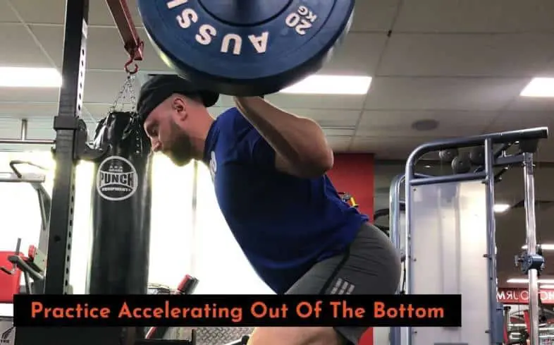 accelerating out of the bottom of the squat to improve squat lockout