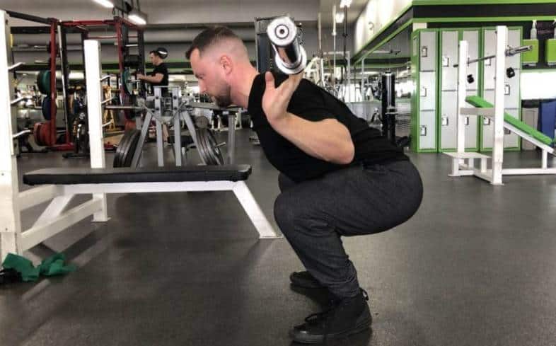 Narrow squat with online dumbbells