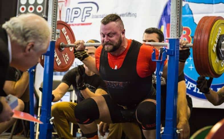 these lifters do not squat with a rounded back in training, and they make every effort to maintain neutral alignment of their spine