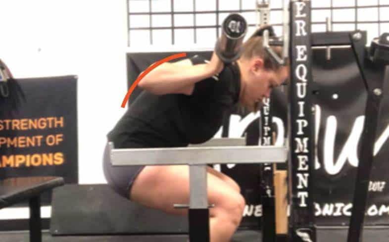 the mid-back rounding in the squat looks like the middle of your back curled forward