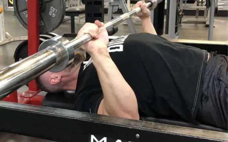 barbell fails exactly halfway between your chest and lockout