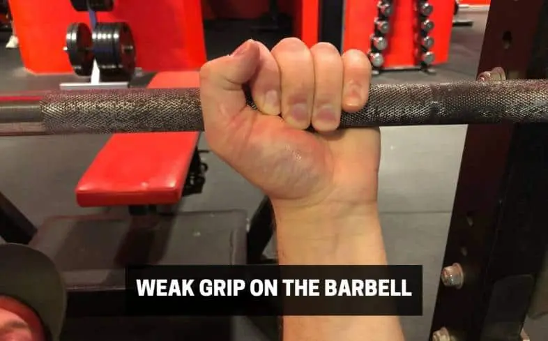 a weak grip on the barbell can lead to your arms shaking