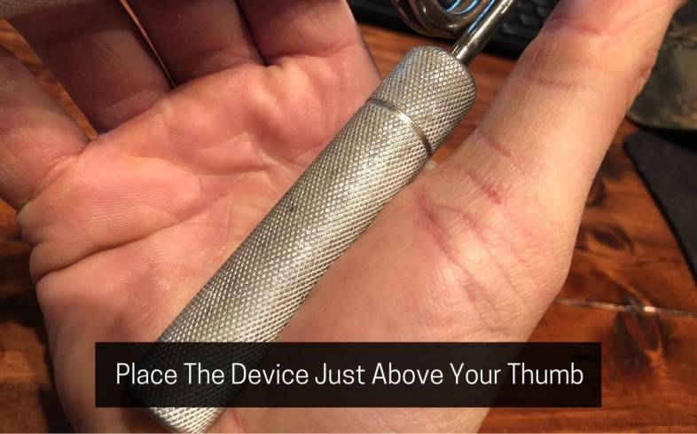 find the base of your thumb and place the device just above it