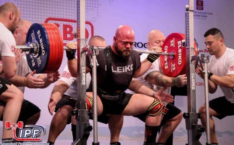 What are squat suits and why are they not allowed in powerlifting