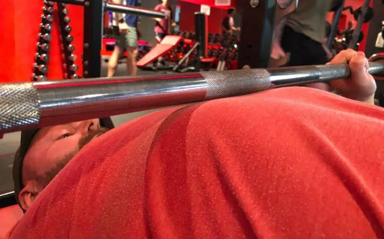 Dumping the bar is the result of losing control of the barbell’s weight right as you land on your chest.