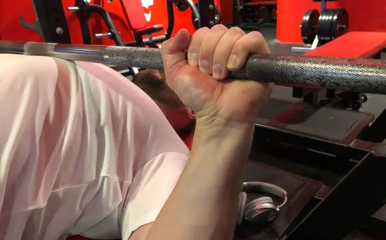 Another common mistake made by novices is not touching the bar to your chest on every rep during bench press.