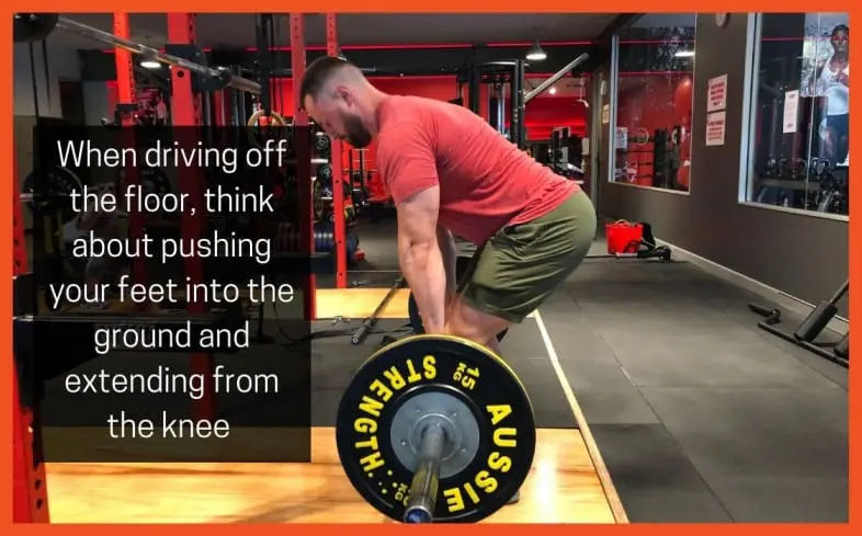 your knees and shins have to move out of the way in order to pull with a vertical bar path