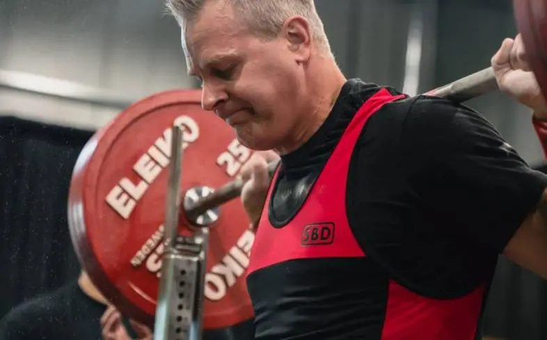 reasons why you may be struggling to maintain a neutral spine during squats