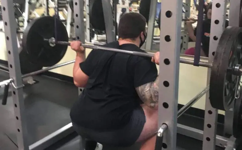 the reverse band squat is used to assist the lifter with bands pulling on the bar upward
