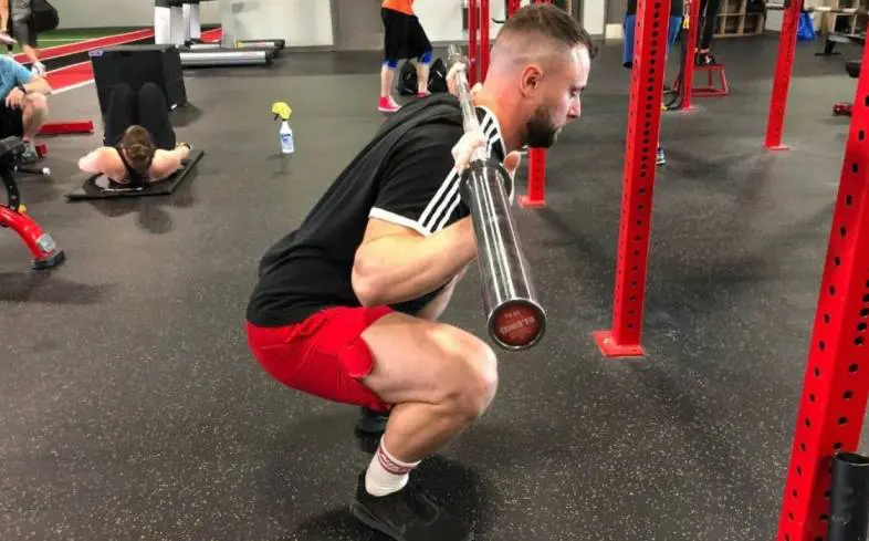 the pause squat is set up exactly the same as the squat, except you will pause for 2-seconds at the bottom range of motion