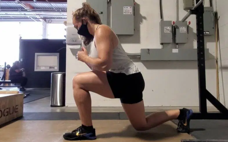 Keep your torso at an incline to feel your glues in the lunge