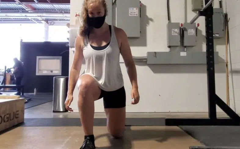 keep the knees in-line with the toes to feel your glues in the lunge