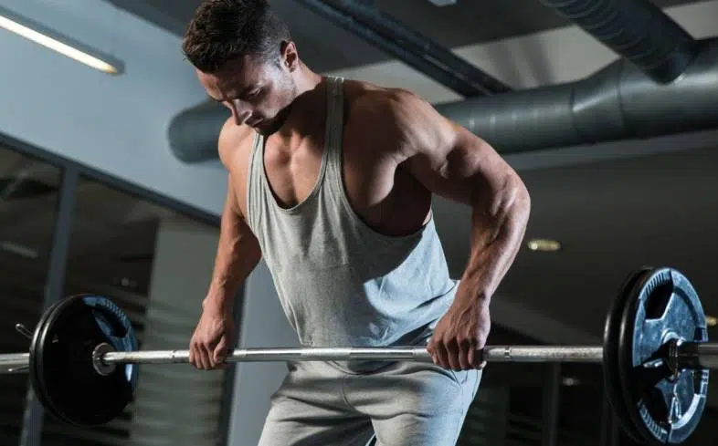 the barbell row requires greater time under tension and loading of the stabilizers which can be beneficial for building the muscles of the back