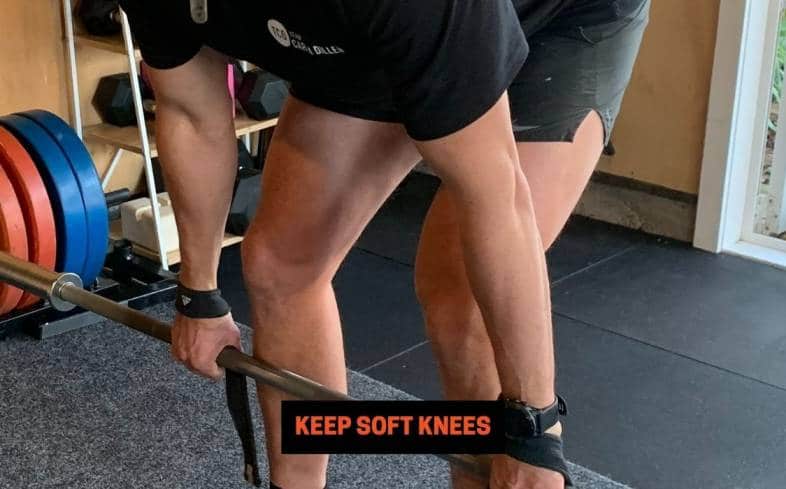 the goal of the keep soft knees is to allow the hamstrings to activate and load the body in the most effective way
