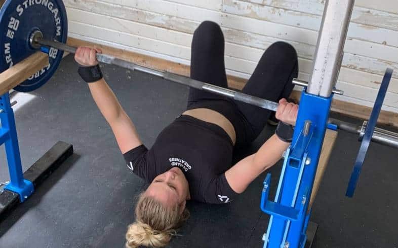 the floor press involves laying down on the floor and performing a bench press