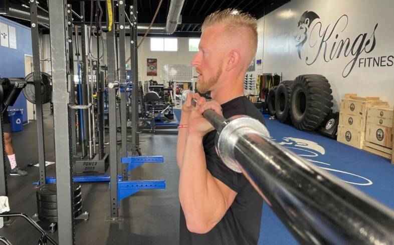 your elbows should be slightly in front of your body when viewed to the side in overhead press
