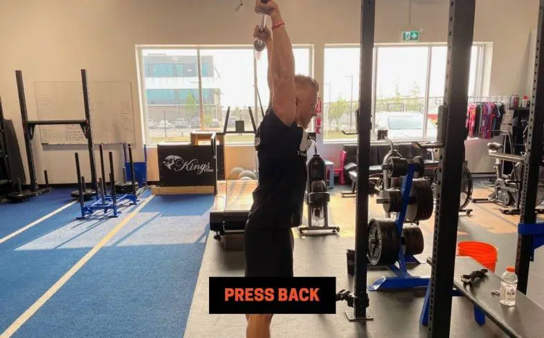 overhead press cue 9 - press back
