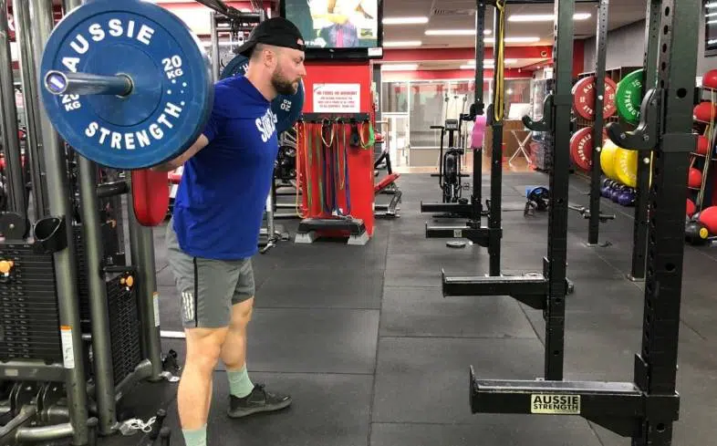the 5 reasons why your legs shake during squats