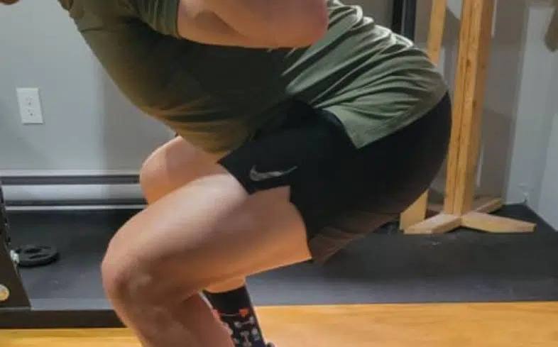 switching to a low bar style of squatting will help us feel the glutes more while squatting
