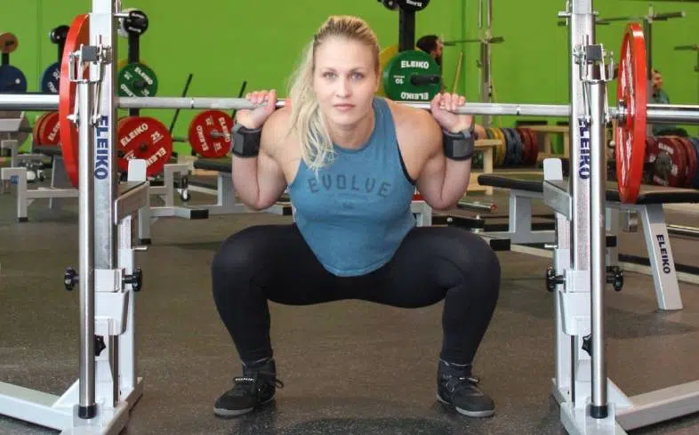 Wide stance squats involves standing with legs further apart than we typically would while squatting