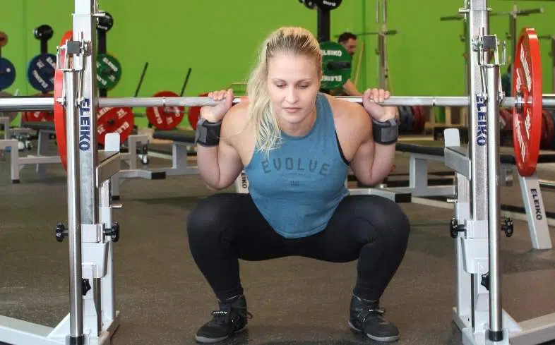 Is it harder to do squats fast or slow?