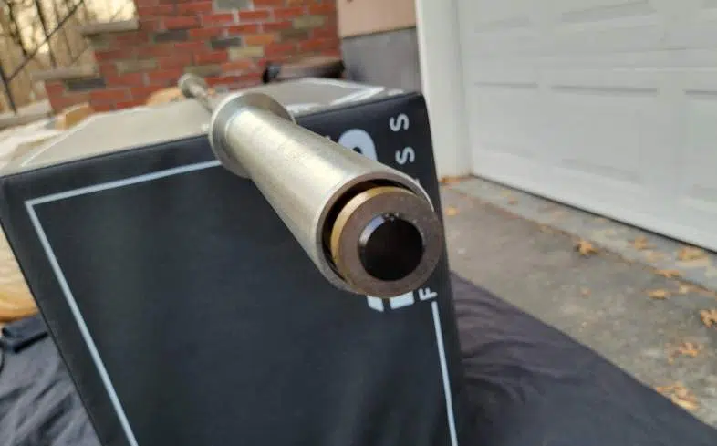 How to do barbell sleeve replacement: Push the sleeve away from you to expose the inside of the sleeve and remove the washers.