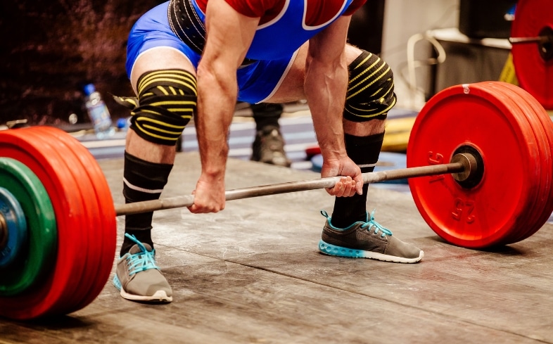benefits of wearing knee wraps for squats