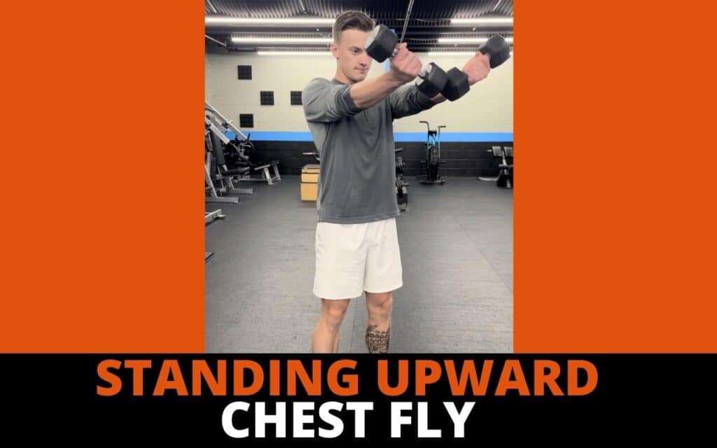 dumbbell chest workout without a bench standing upward chest fly by jake woodruff strength coach personal