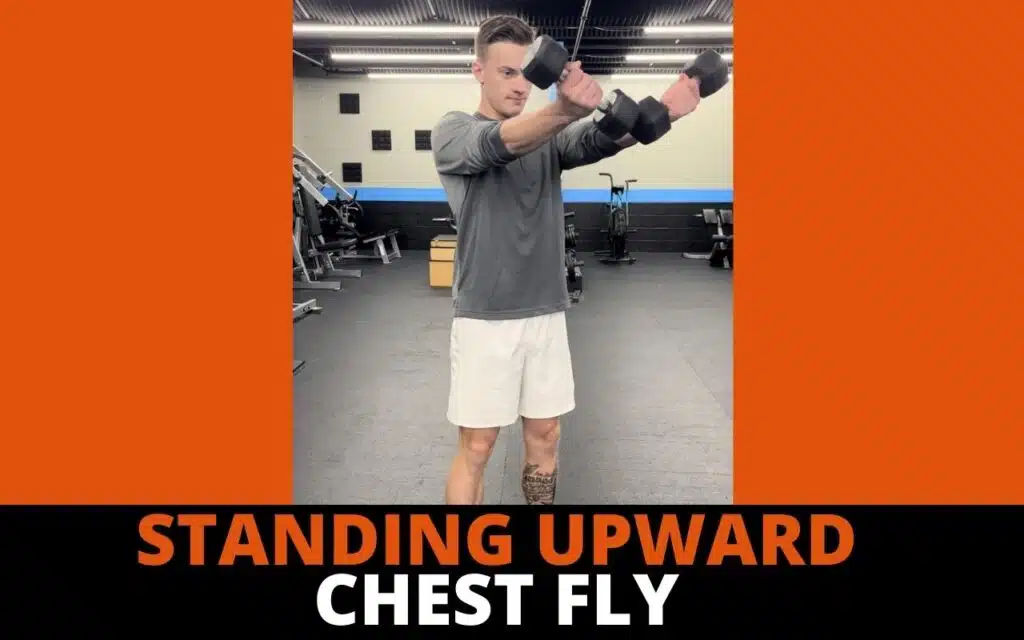 dumbbell chest workout without a bench standing upward chest fly by jake woodruff strength coach personal