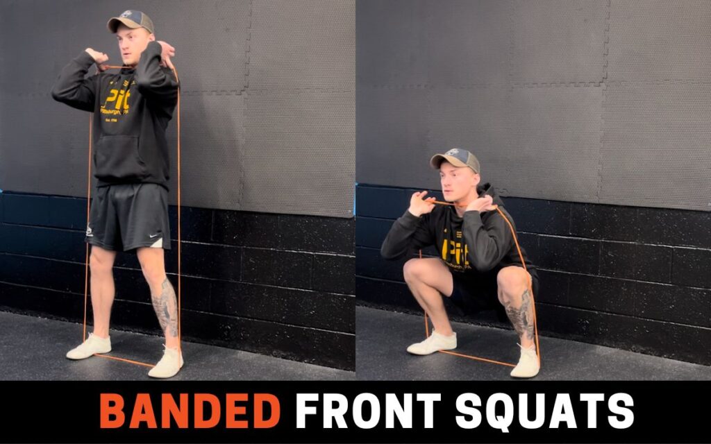 Banded Front Squats is one of the best leg extension alternatives, taken by Jake Woodruff, Strength Coach