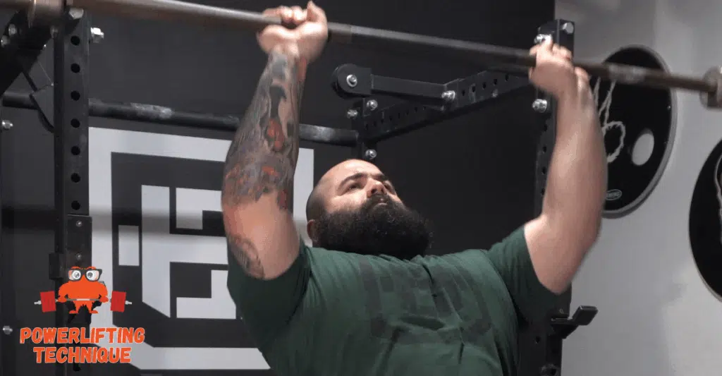 If you find yourself looking at the bar at the top of overhead press, that's incorrect form.