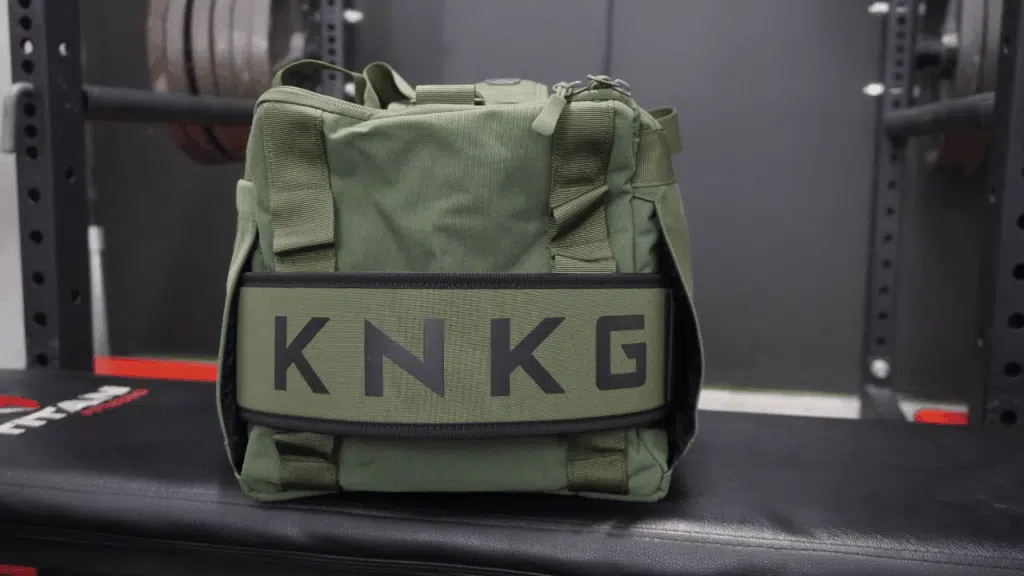 A side view of the powerlifting gym bag with my lifting belt stored on the side.