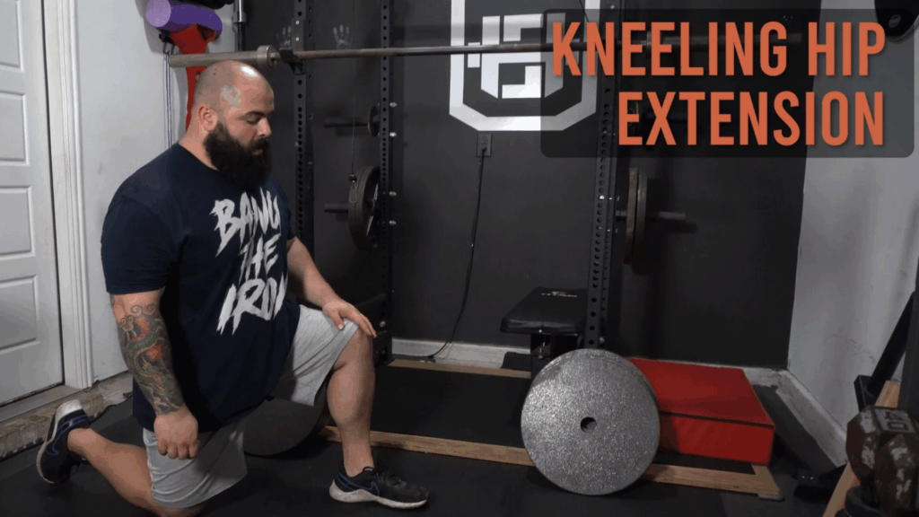 While explaining static vs dynamic stretching, strength coach shows how to do kneeling hip extensions.